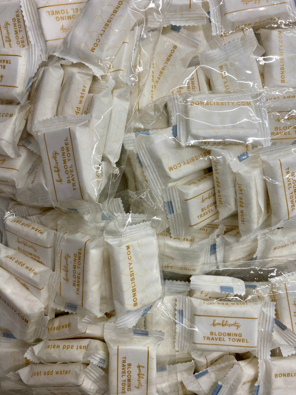 Bulk Blooming Travel Towel (100 towels) - MSRP $1.50-$2.00 per towel